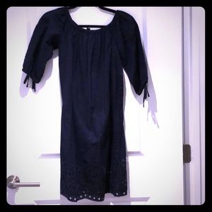 Peasant style dress with embroidered hem